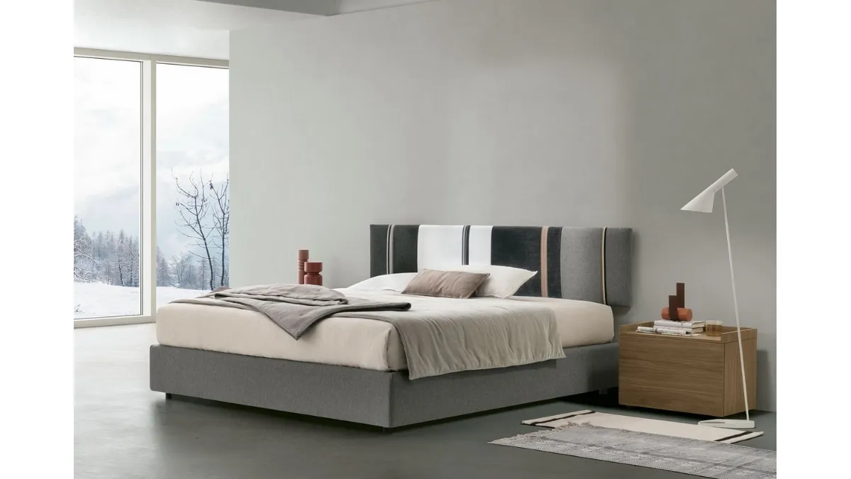 Letto sommier Diagonal con box contenitore e pannello testiera di Tomasella